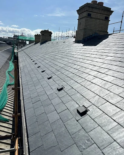 Pro shield roofing and building photo 1
